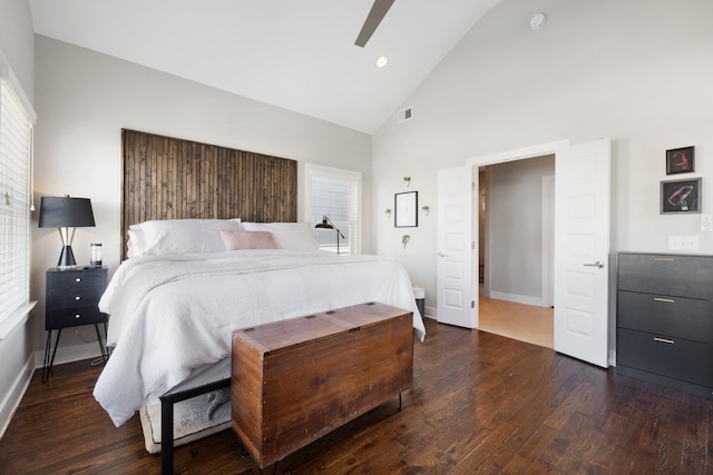 bedroom with high vaulted ceiling, ceiling fan, and dark hardwood / wood-style floors