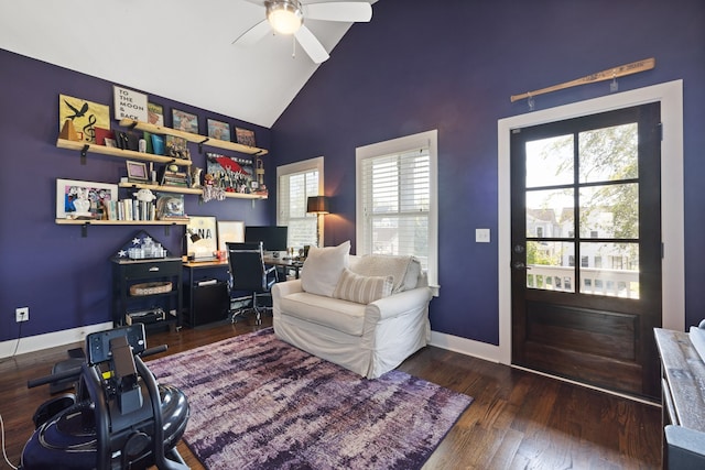 office area featuring ceiling fan, dark wood-type flooring, and high vaulted ceiling