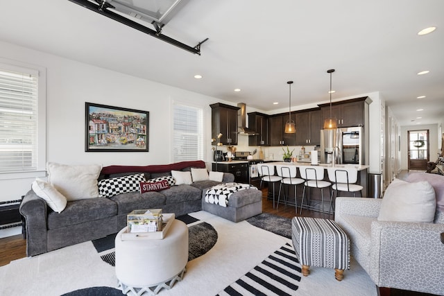 living room with dark hardwood / wood-style floors