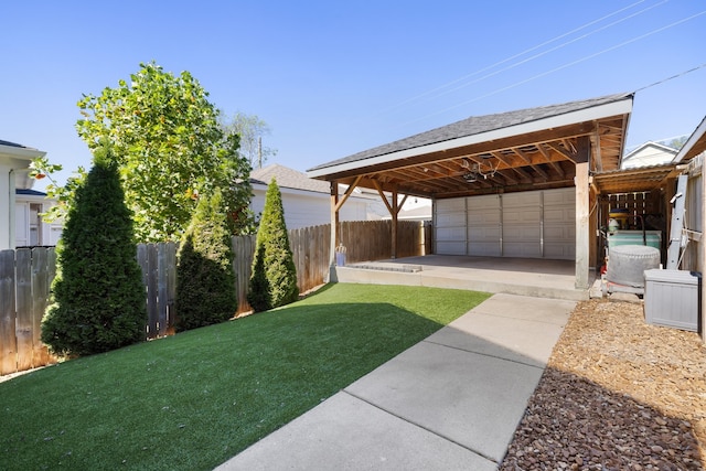 view of yard with a garage