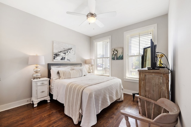 bedroom featuring ceiling fan and dark hardwood / wood-style floors