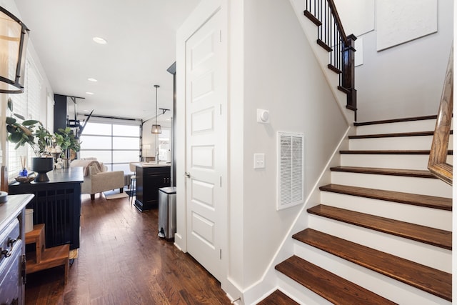 stairway with wood-type flooring