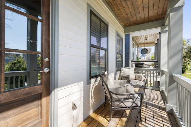 balcony featuring a porch