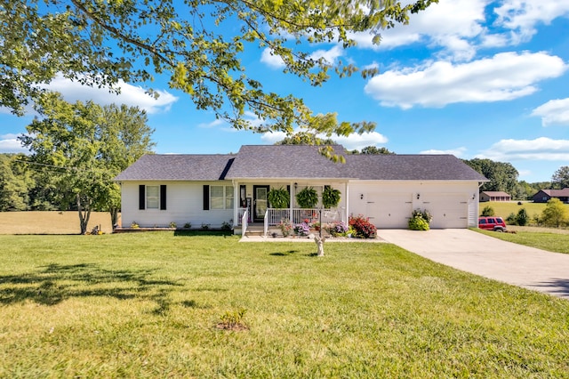 single story home featuring a garage, covered porch, and a front lawn