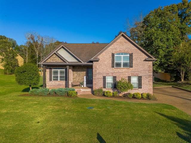 view of front of home with a front lawn