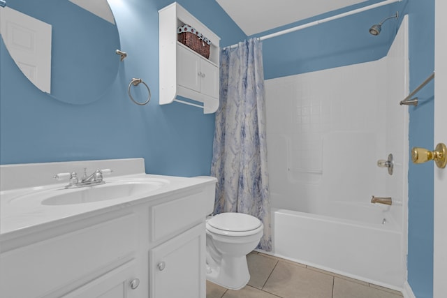 full bathroom featuring shower / bath combo, tile patterned floors, vanity, and toilet