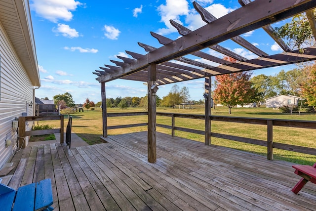 deck with a lawn and a pergola