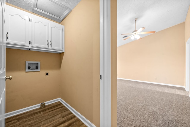 washroom with washer hookup, hookup for an electric dryer, cabinets, a textured ceiling, and carpet flooring