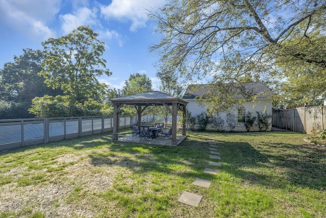 view of yard featuring a gazebo and a patio area