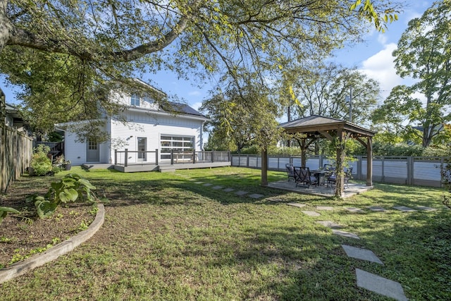 view of yard featuring a gazebo and a patio area