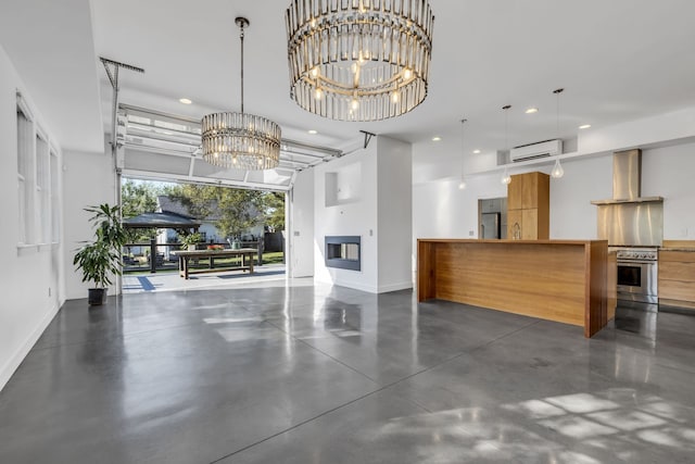 reception featuring a notable chandelier, a fireplace, and sink