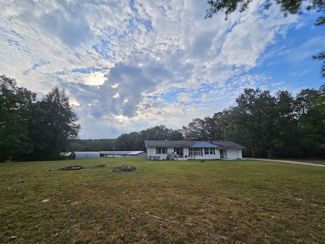 ranch-style house with a front yard