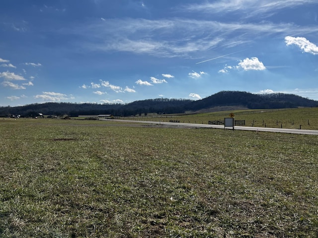 view of mountain feature with a rural view