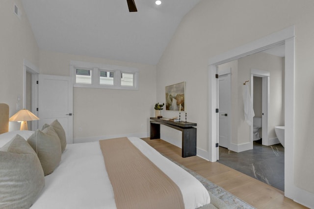 bedroom featuring hardwood / wood-style flooring, ceiling fan, and vaulted ceiling