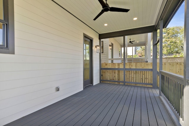 wooden deck with ceiling fan