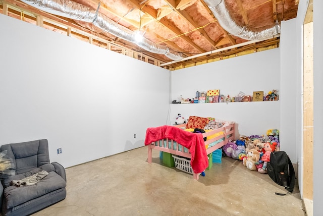 bedroom with concrete flooring