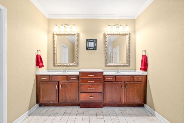 bathroom featuring ornamental molding and vanity