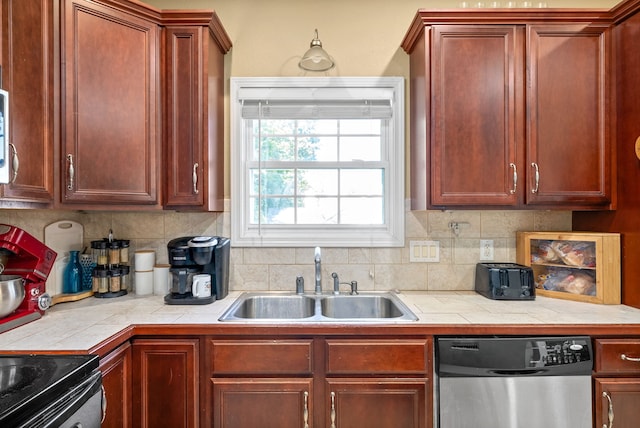 kitchen with dishwasher, sink, electric range, and decorative backsplash