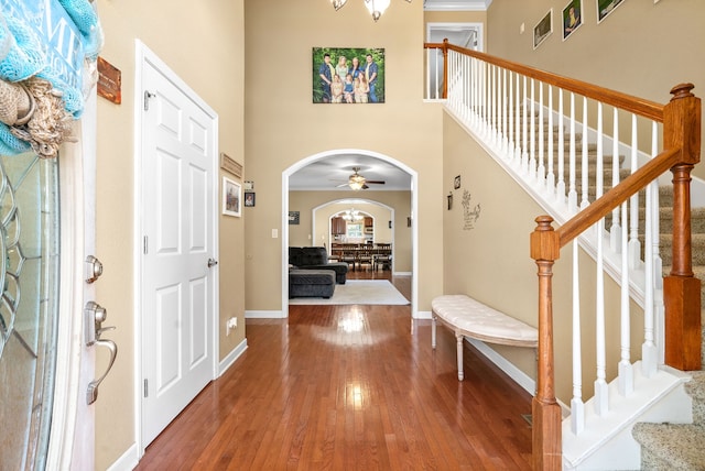 entryway with hardwood / wood-style floors