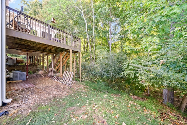 view of yard featuring a wooden deck