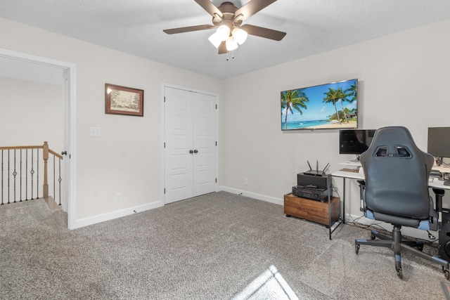 home office with carpet and ceiling fan