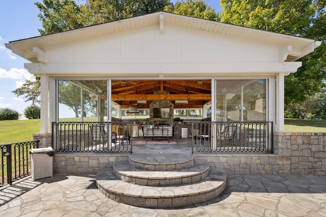 view of patio / terrace featuring ceiling fan