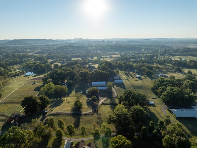 birds eye view of property featuring a rural view