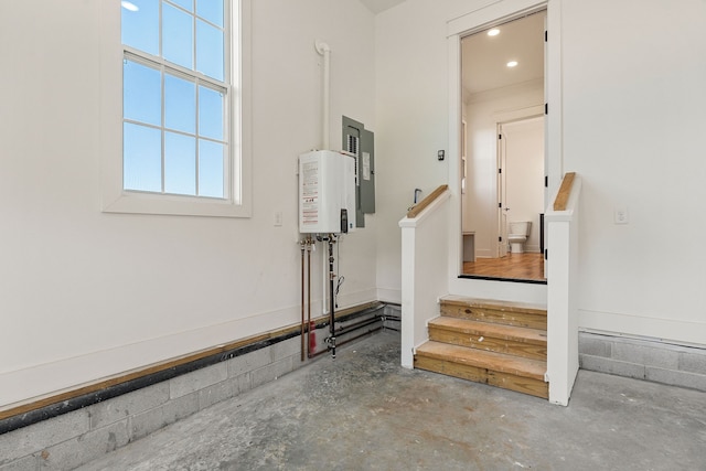 interior space featuring concrete flooring and electric panel