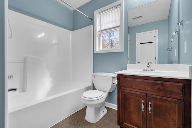 full bathroom featuring tile patterned flooring, vanity, toilet, and bathtub / shower combination