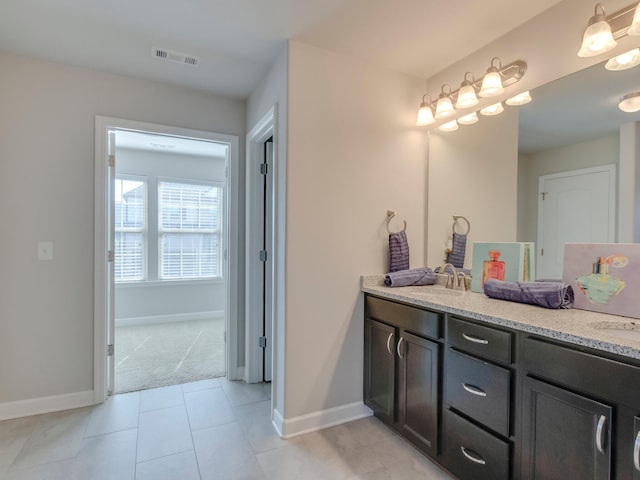 bathroom featuring vanity and tile patterned floors