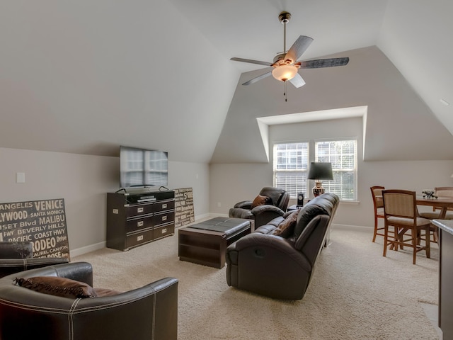 living room with light colored carpet, vaulted ceiling, and ceiling fan