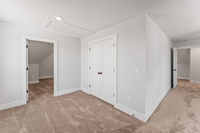 bonus room with light carpet