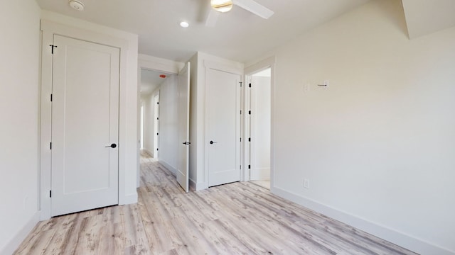 unfurnished bedroom with recessed lighting, baseboards, light wood finished floors, and ceiling fan