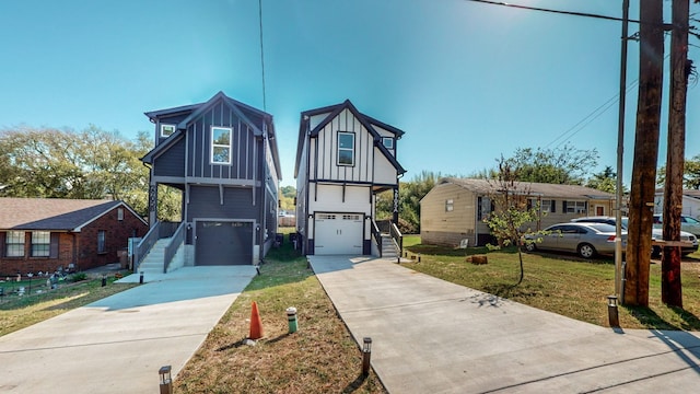 view of front of home featuring a front yard, driveway, stairs, a garage, and board and batten siding