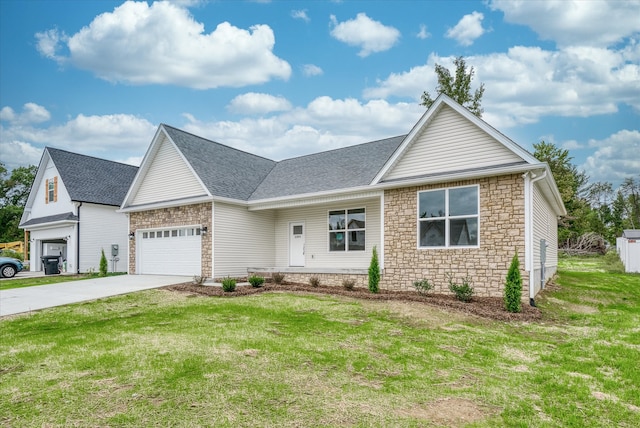 view of front of house with a front yard and a garage