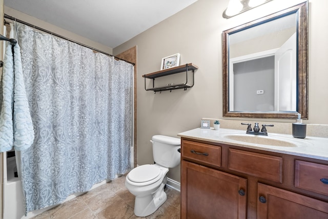 full bathroom with vanity, shower / bath combo with shower curtain, and toilet