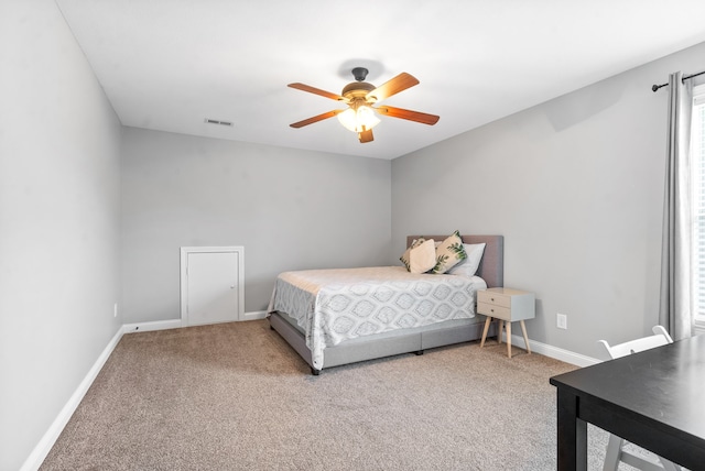 carpeted bedroom featuring ceiling fan