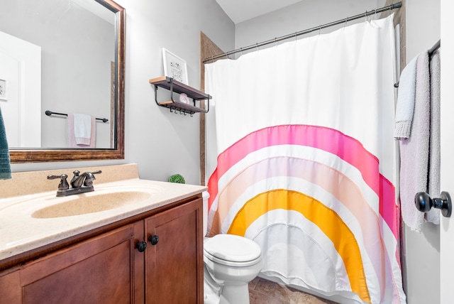 bathroom with vanity, tile patterned flooring, toilet, and a shower with shower curtain