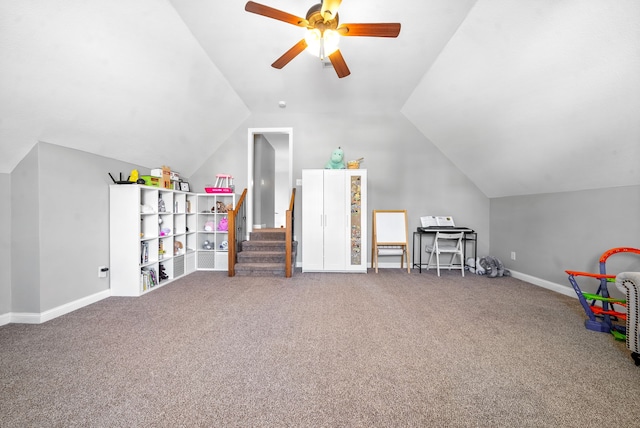 playroom featuring lofted ceiling, ceiling fan, and carpet flooring