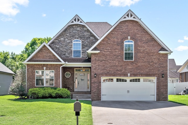 view of front facade featuring a garage and a front lawn