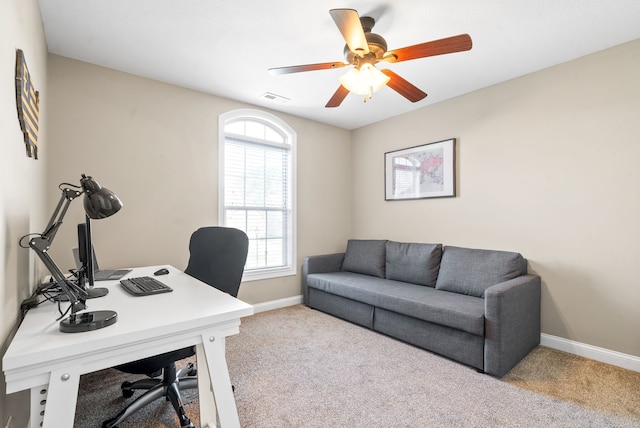 office area with ceiling fan and light colored carpet