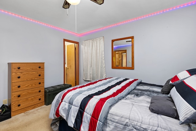 bedroom featuring ceiling fan and light colored carpet