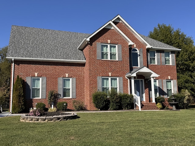 view of front facade with a front yard