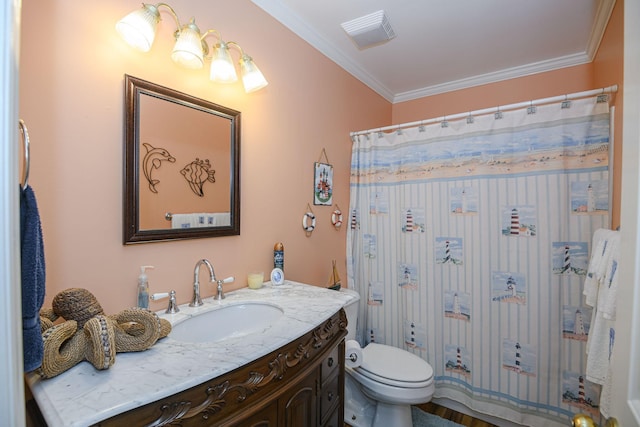 bathroom with vanity, a shower with curtain, ornamental molding, and toilet