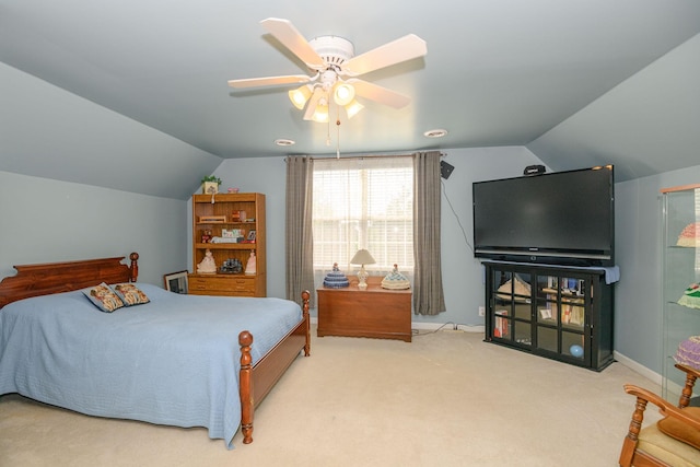 bedroom featuring ceiling fan, lofted ceiling, and carpet