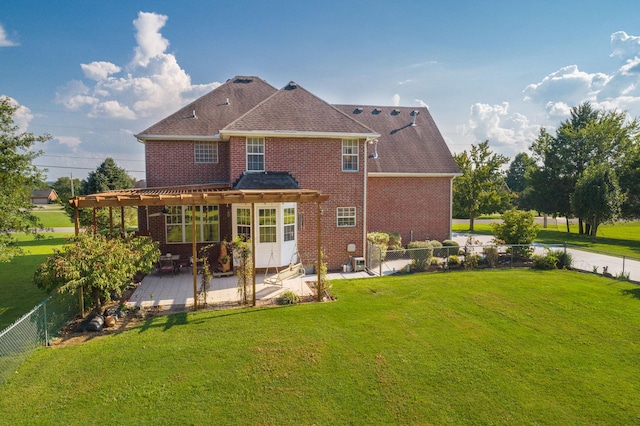 back of house featuring a pergola, a yard, and a patio area