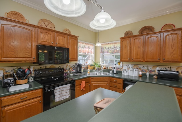 kitchen featuring ornamental molding, sink, pendant lighting, and black appliances