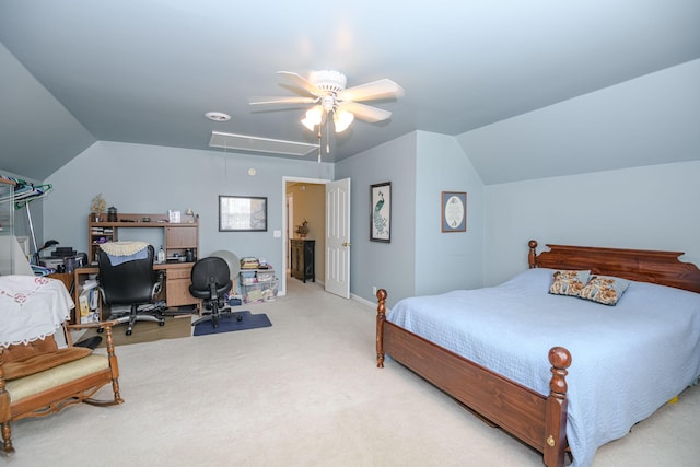 bedroom featuring ceiling fan, vaulted ceiling, and light carpet