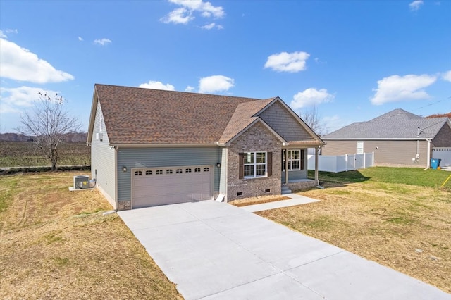 view of front of property with a front lawn and a garage