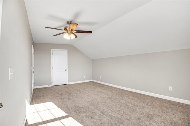 bonus room with carpet flooring, ceiling fan, and vaulted ceiling